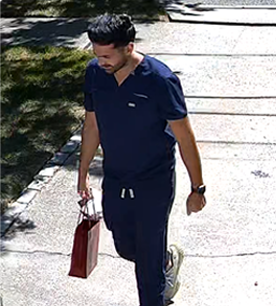Jacob Avital Case - Surveillance footage of Ariel Zirkiyev arriving to scam a business